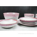 Reactive glazed stoneware dinner set with pink rim